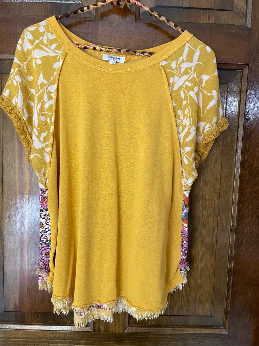 Umgee multi-pattern top, fringe hems, size M, great condition
